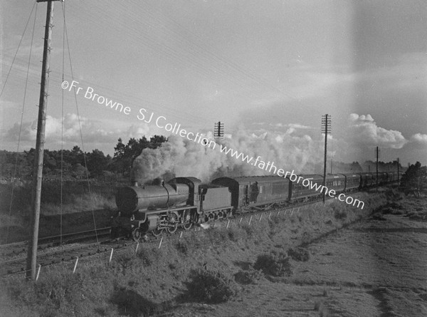 TRAIN WITH SMOKE IN OPEN COUNTRYSIDE